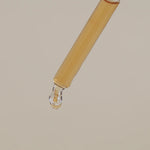 Serum drop of product about to drip.