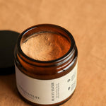 Beauty Elixir powder, made by LongevityLife, on fabric.