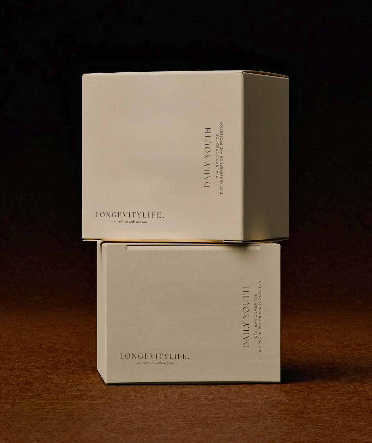 Two boxes of Daily Youth placed on a wooden table, showcasing their colorful packaging and branding.