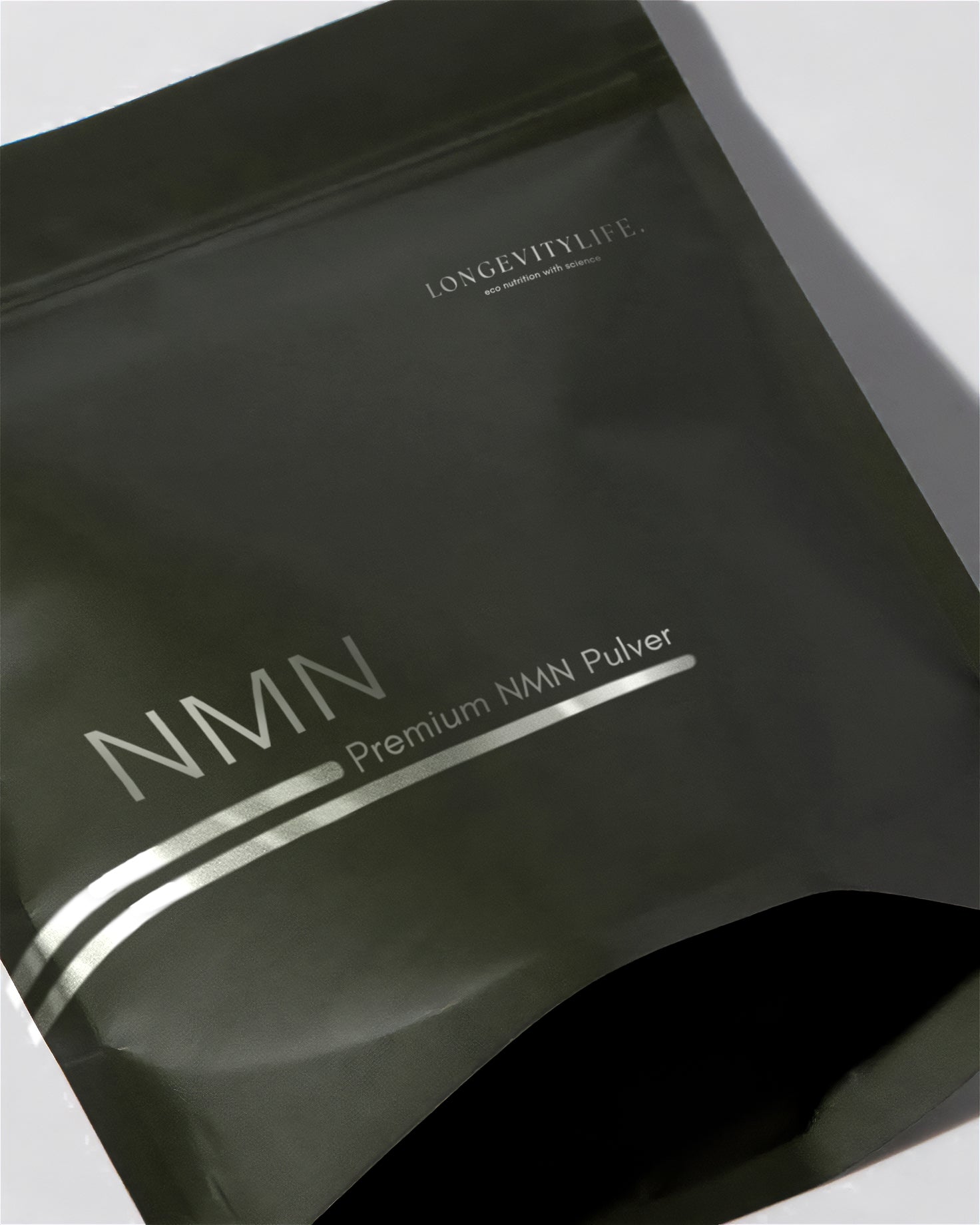 A close up of the NMN green bag.