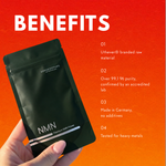 Hand holding the NMN powder pouch next to four product facts on raw material, purity, origin and testing