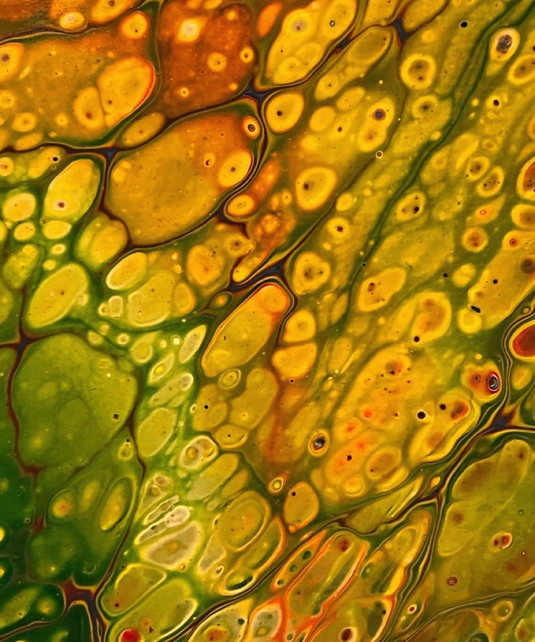 A close-up of a rich array of colors and fluid forms, creating a lively visual experience.