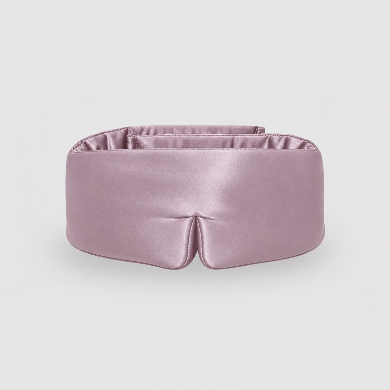 Silk-Schlafmaske in Rosa mit Aussparung an der Nase, Packshot auf hellgrauem Hintergrund