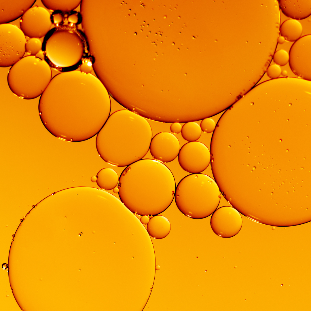 Orange bubbles on a yellow background